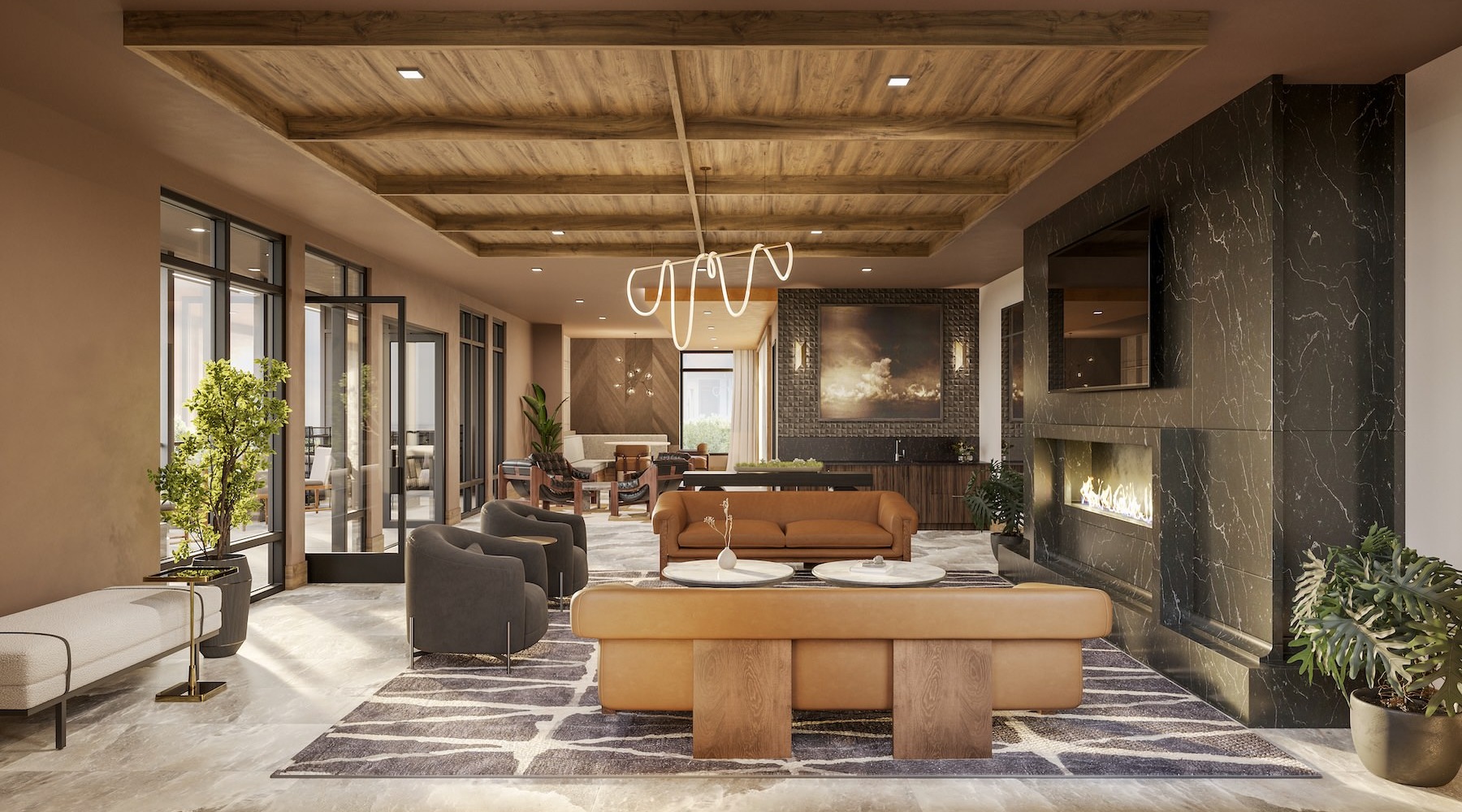 a clubroom with a couch, tables and chairs